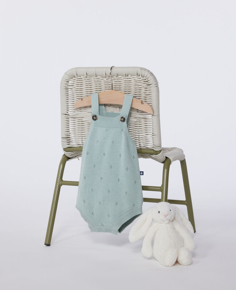 Babies' rompers knitted in a pretty pattern and with straps
