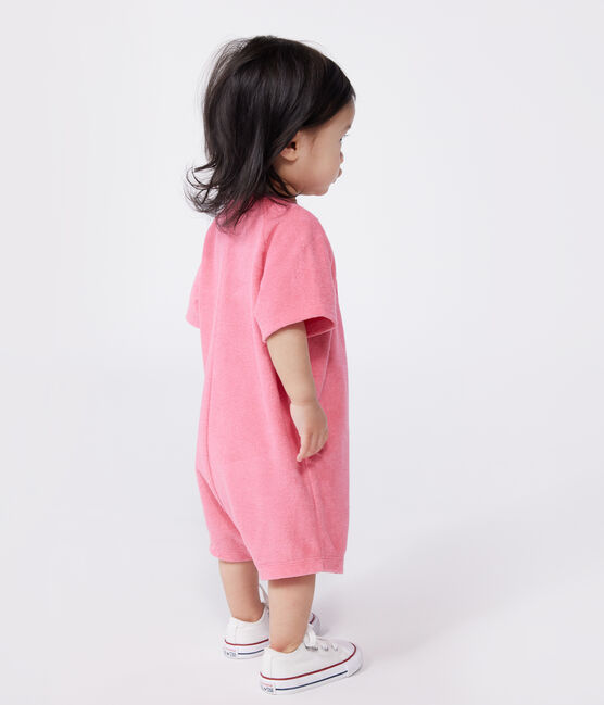 Babies' short-sleeved plain cotton towelling playsuit with a badge PEONIA pink