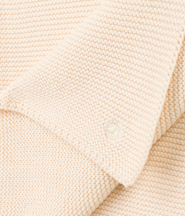 Knitted blanket. Ecru