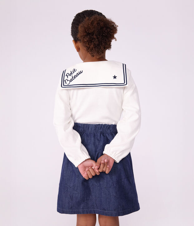 Short skirt in plain denim with a star pattern blue