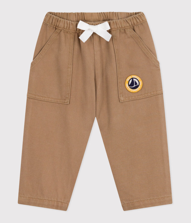 Babies' trousers in plain cotton with a badge, cargo style beige