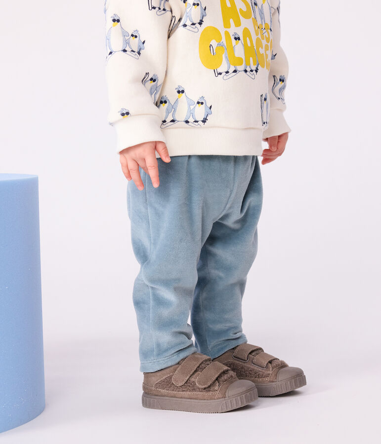 Babies' trousers in plain terry velour blue