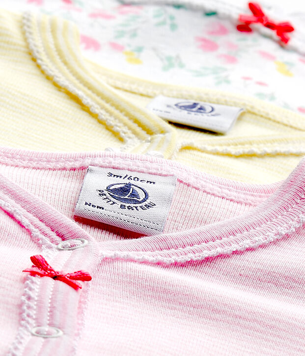 Set of three baby girl's sleepsuits white