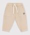 Babies' cargo-style trousers in plain cotton with a badge beige