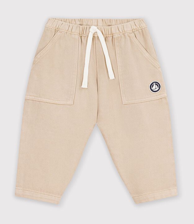 Babies' cargo-style trousers in plain cotton with a badge beige