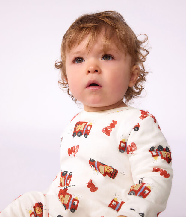 Babies' pyjama suit in tube knit fabric with a printed firefighter design and a back opening white/multicolor