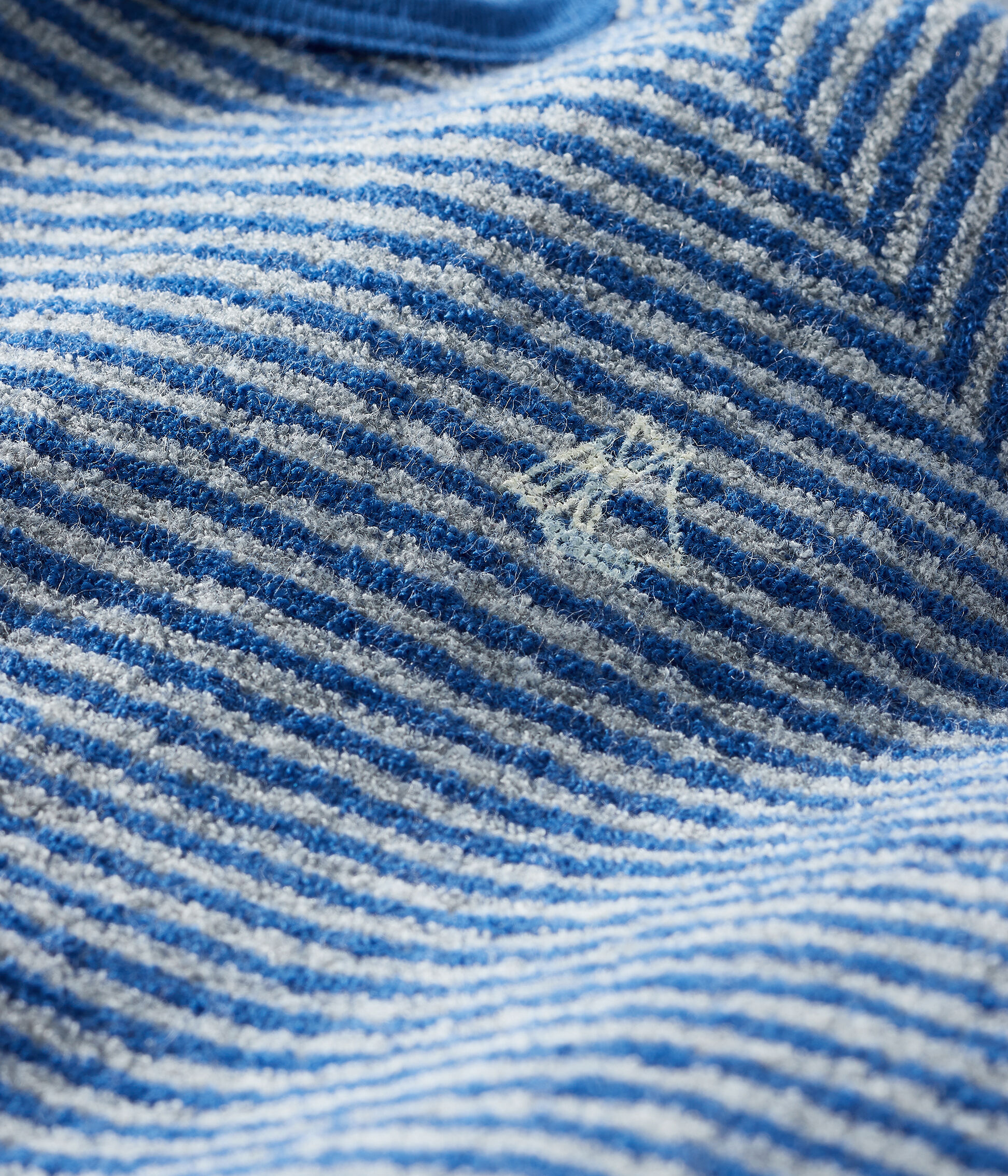 blue terry towelling sleepsuits