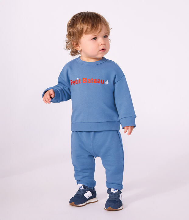 Babies' jogging bottoms in plain cotton blue