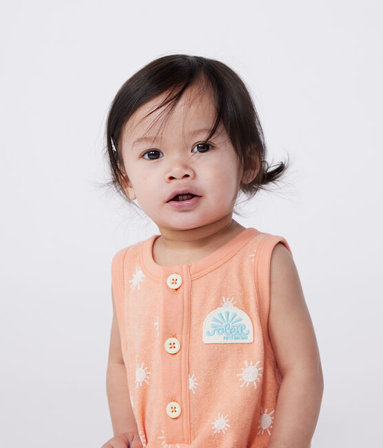 Babies' sleeveless cotton terry playsuit with a sunshine print ABRICOT orange/MARSHMALLOW