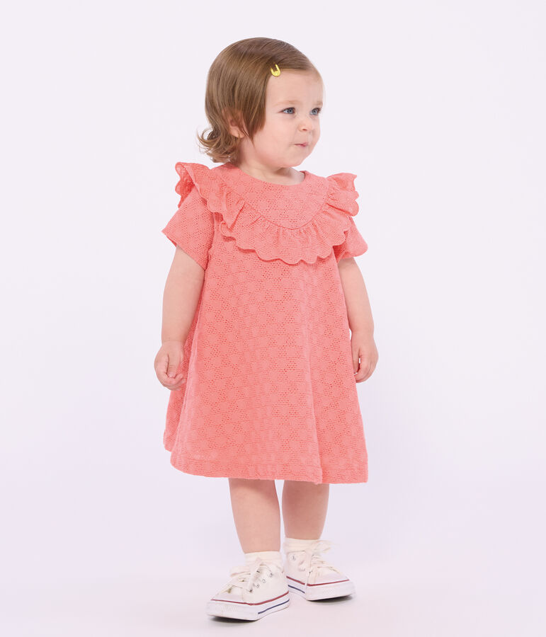 Babies' dress in broderie anglaise with short sleeves and a hearts motif pink