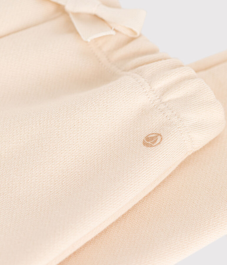 Babies' jogging bottoms in plain cotton Ecru