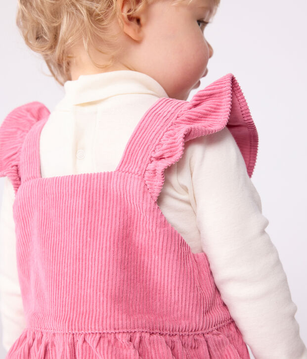 Babies' dungarees in plain corduroy with ruffles and long legs pink