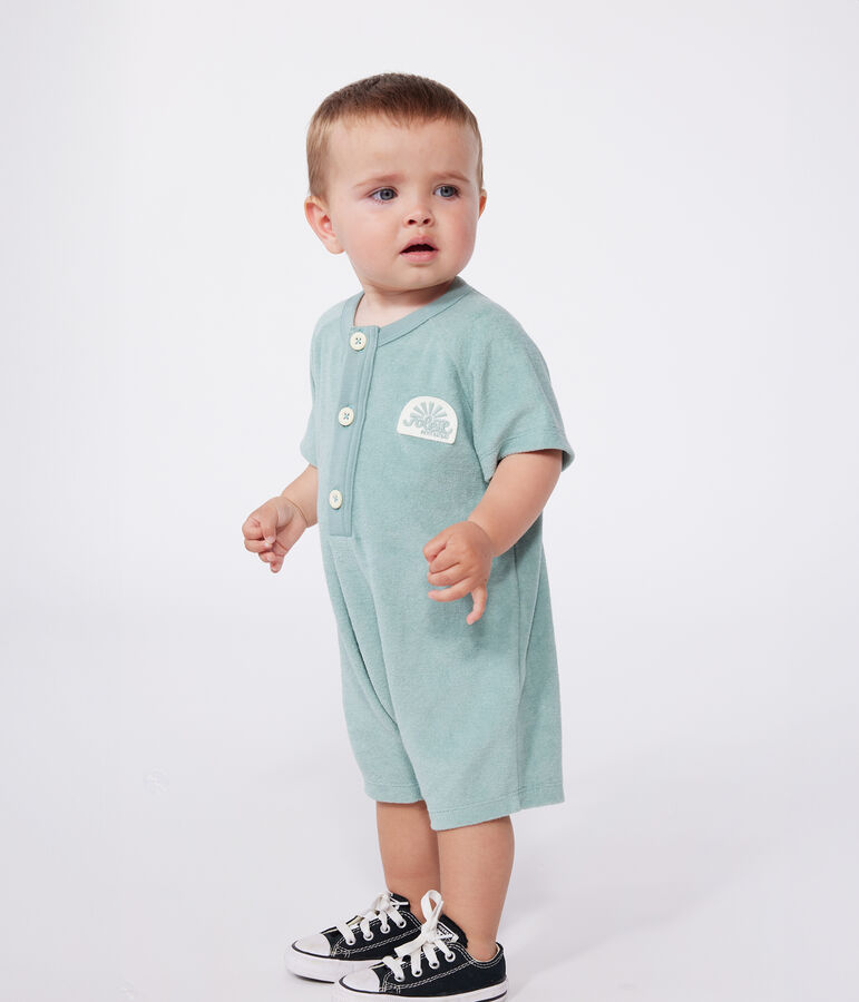 Babies' short-sleeved plain cotton towelling playsuit with a badge green