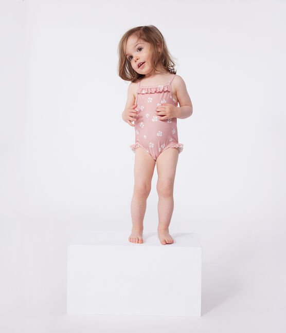 Babies' one-piece swimsuit with frills and a floral print. CHARME pink/MARSHMALLOW white