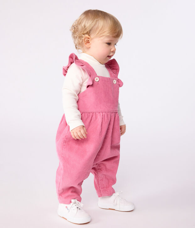 Babies' dungarees in plain corduroy with ruffles and long legs pink