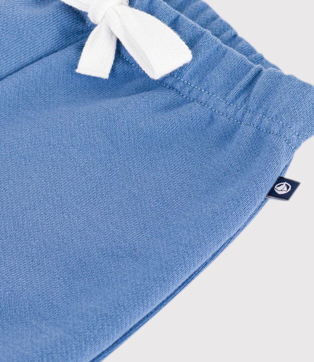 Babies' jogging bottoms in plain cotton blue