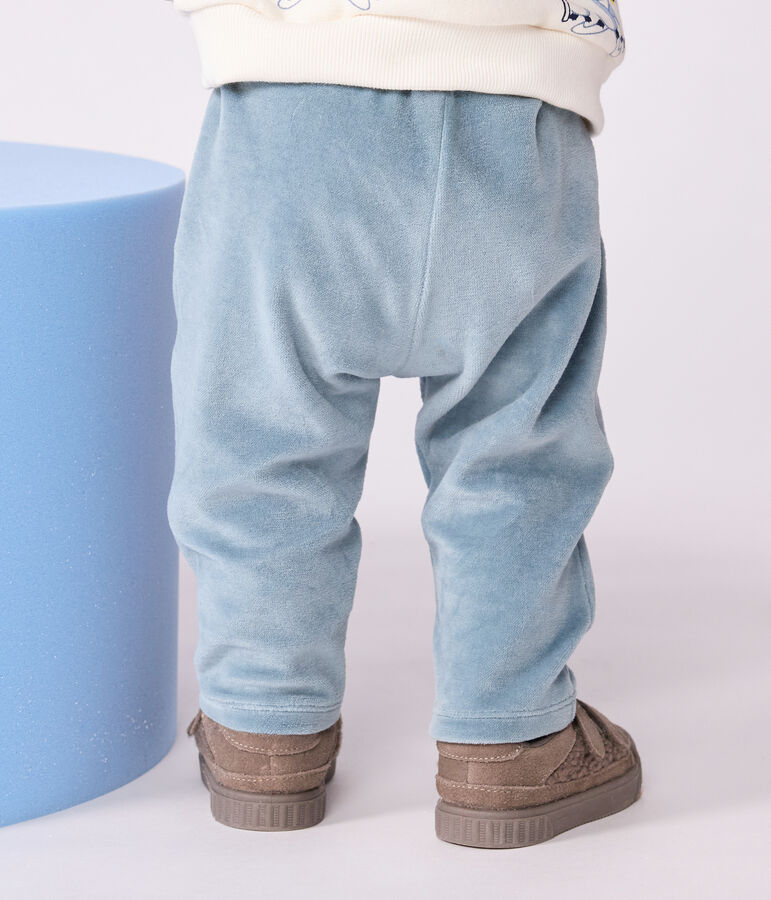 Babies' trousers in plain terry velour blue