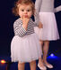 Babies' dress in stripy tube knit and tulle