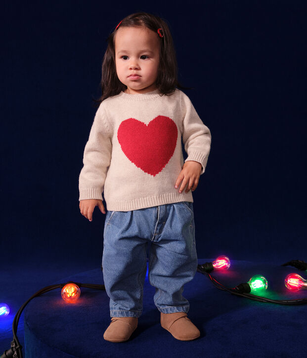 Babies' knitted jumper containing wool. Ecru/red