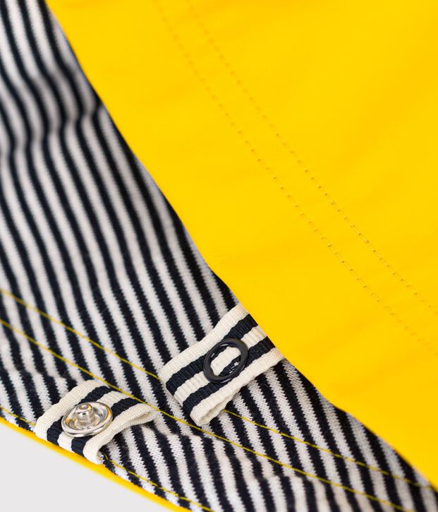 Baby rain cape in cotton and coated knit fabric yellow