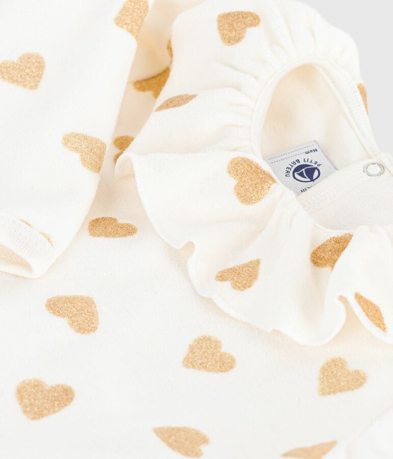 Baby pajamas in velvet with opening at the back and printed with sequined hearts MILK /DORE