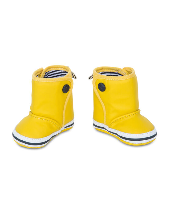 Yellow waxed exterior and pinstriped cotton on the inside. JAUNE yellow