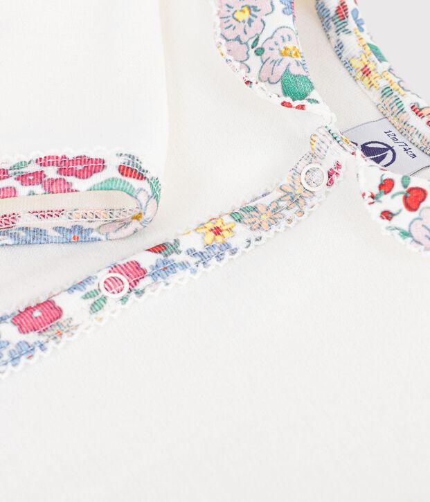 Babies' pyjama suit in plain velour with a collar and floral print detail white
