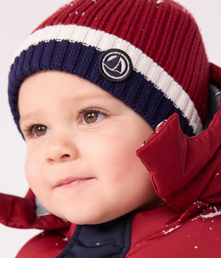 Babies' knitted beanie with a fleece lining red/multicolor