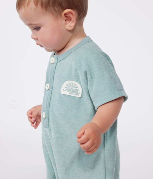 Babies' short-sleeved plain cotton towelling playsuit with a badge green