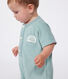 Babies' short-sleeved plain cotton towelling playsuit with a badge