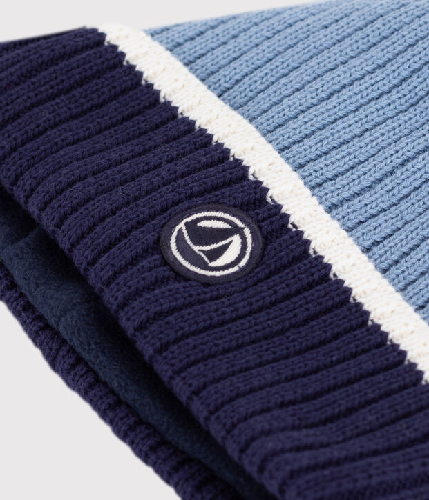 Children's knitted beanie hat lined in polar fleece blue/white