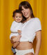Mother and baby all in white