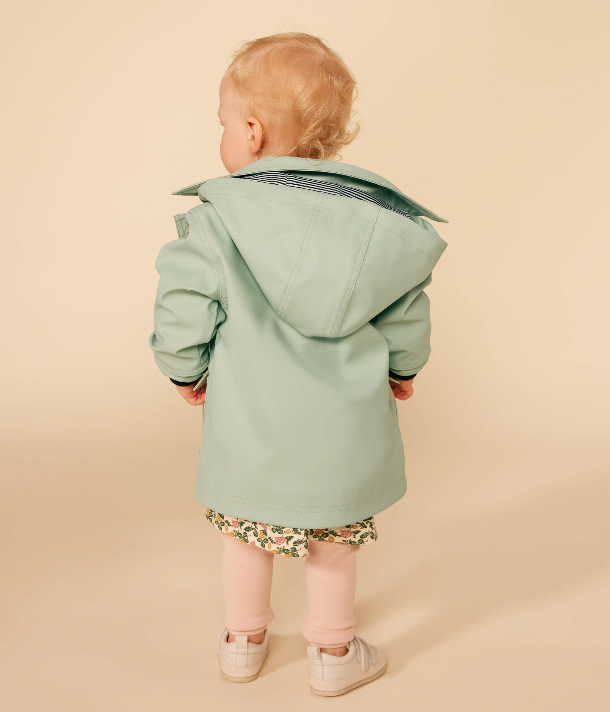 Baby in discount a raincoat