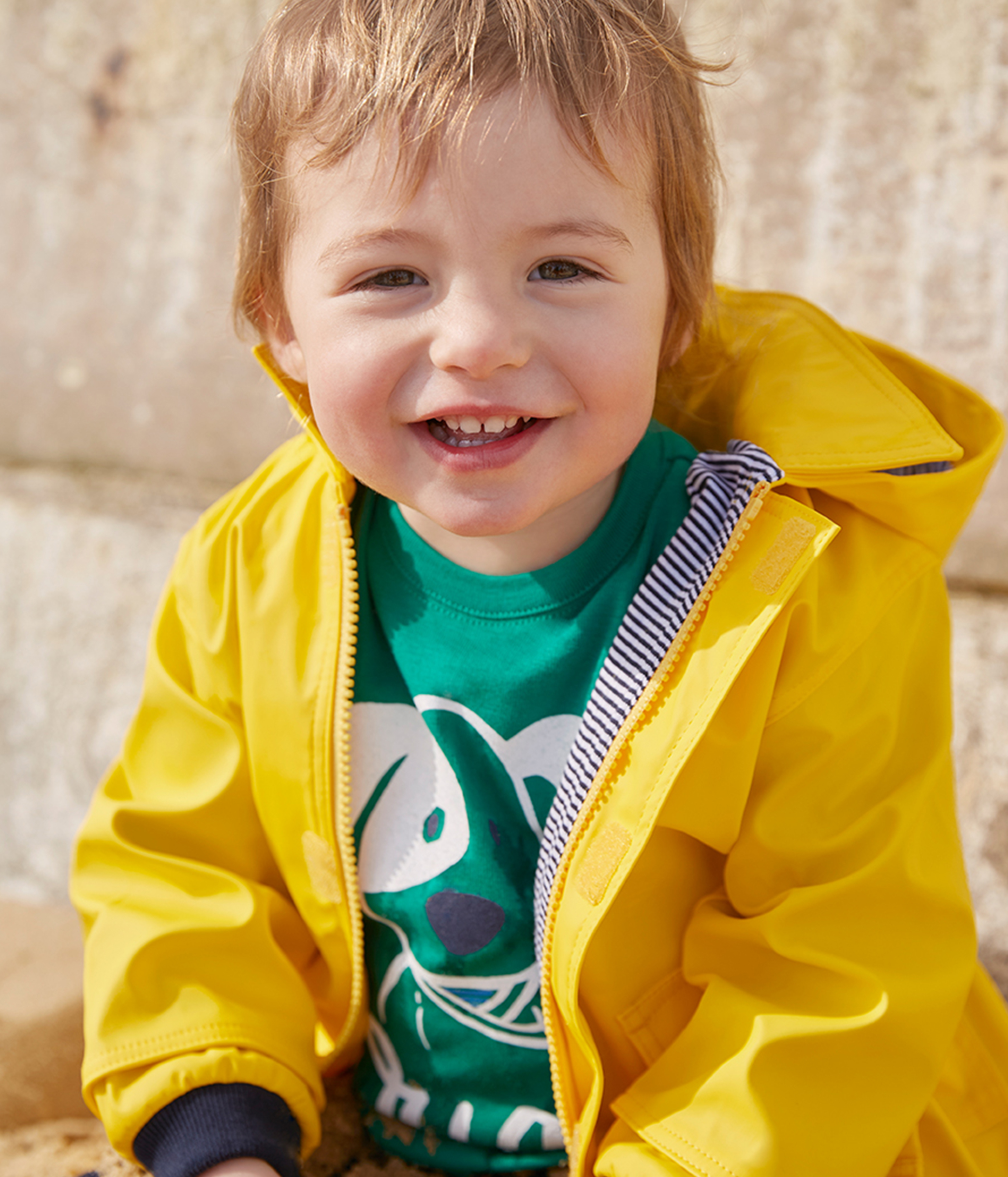 newborn yellow raincoat